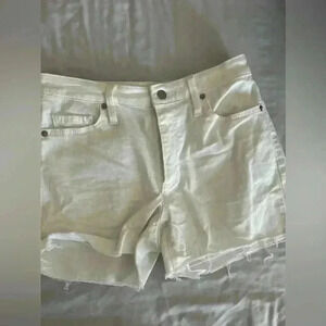 Universal Thread white shorts, jeans material with ripped look.